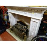 White fire surround with vintage electric heater E/T