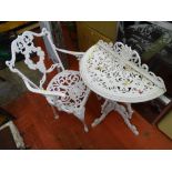 Half moon white painted metal garden table and a single chair