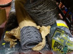 Parcel of PVC coated chain link fencing and a reel of barbed wire