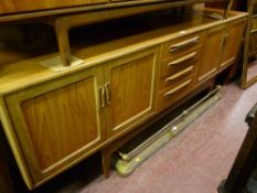 G-Plan sideboard with four cupboard doors and four central drawers