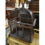 An ornamental hanging bird cage