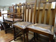 A pair of vintage oak splat back dining chairs together with an oak armchair & another