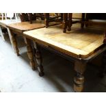 Two vintage oak extending dining tables