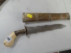 A Middle Eastern bone-handle dagger