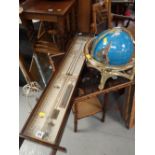 An Admiral Fitzroy barometer together with a decorative globe