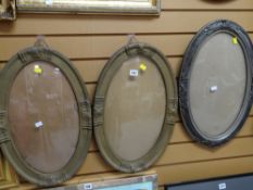 Three vintage oval convex wall hanging picture frames