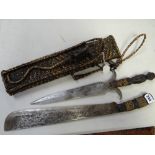 An African tribal two-piece knife set in carry case