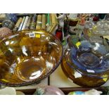 A large decorated carnival-glass bowl together with an amber glass bowl etc