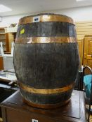 A small copper banded barrel for use as umbrella / stick stand, 44cms high