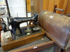 A vintage cased Singer sewing machine