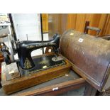 A vintage cased Singer sewing machine