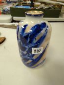 A vintage Doulton cobalt blue & gilt floral decorated narrow necked vase
