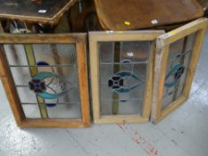 Three framed lead & stained glass panels