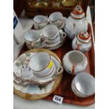 A Japanese Satsuma decorated eggshell export teaset