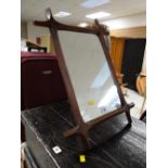 A rustic oak easel-style dressing mirror