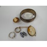 A silver bangle, 9ct gold cameo brooch together with another yellow metal cameo, silver ring etc