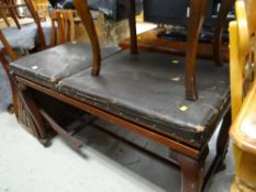 A vintage examination / massage couch with adjustable back