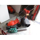 A Flymo rotary lawn mower together with a Qualcast hedge trimmer E/T