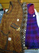 Seven various patterned ladies' sleeveless waistcoats fashioned from traditional Welsh blankets
