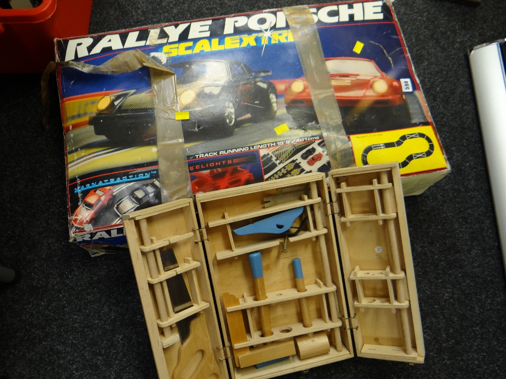 A boxed Scalextric Raleigh Porsche racing car set & child's boxed carpentry set