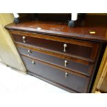 A modern mahogany effect three-drawer chest of drawers