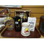 Tray of drinking related items including Dimple Whisky bottle, water jugs, Guinness clock etc