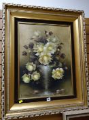 A gilt framed oil on board - still life of yellow roses, signed JEANETTE DYKMAN