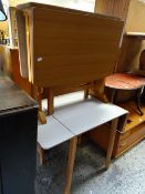 A vintage drop end Formica-topped kitchen table together with a similar