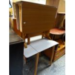 A vintage drop end Formica-topped kitchen table together with a similar