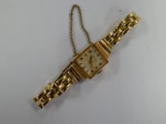 An 18ct gold Mithra ladies wristwatch