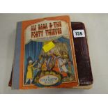 A vintage Ali Baba & the Forty Thieves, Peep Show pop up book together with a vintage autograph