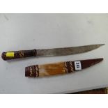 An African animal skin decorated long knife