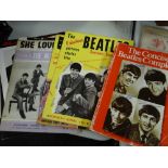 A parcel of Beatles ephemera including 'The Concise Beatles Complete' etc