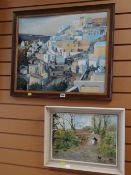 A framed oil on board of a Mediterranean hill town by E M PHILLIPS, dated '89 together with a framed
