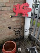 A painted cast metal red dragon weather vain (outside)