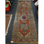 A vintage & well worn Middle Eastern wool runner, 255 x 86cms