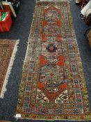 A vintage & well worn Middle Eastern wool runner, 255 x 86cms
