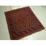 A blue & red patterned Gazak Indian rug, 124 x 116cms