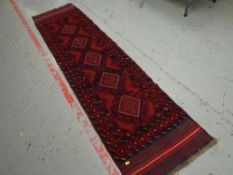 A red & blue patterned Meshwani Indian runner, 270 x 67cms