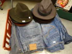 Crate of various sized men's denim jeans & a parcel of gentleman's felt hats