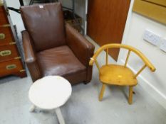 A vintage leatherette child's armchair, three legged stool, another wooden child's chair