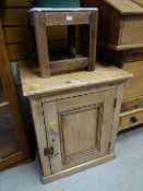 A small pine pot cupboard together with a stool