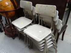 A set of ten vintage metal child's school chairs