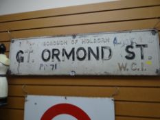 A GT.ORMOND ST cast metal street sign