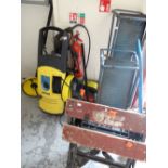 A Karcher power washer, workbench, car ramps etc