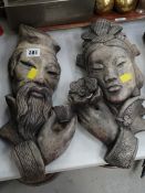 Two carved stone wall hanging Chinese figures