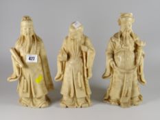 Three carved believed resin Chinese figures