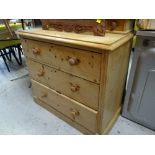 A pine three-drawer chest of drawers