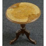 A walnut & inlaid top carved footed table