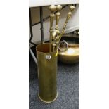 Brass companion set in a brass shell case